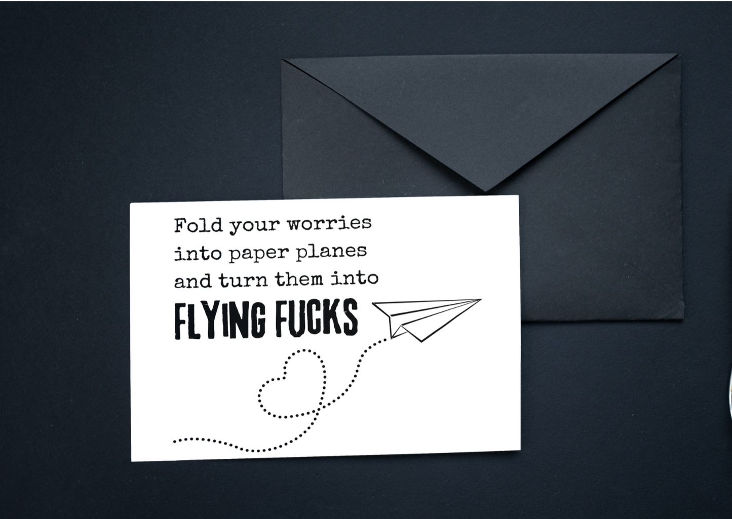 Fold your worries into paper planes and turn them into flying fucks greeting card